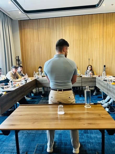 Lewis Hunter leading a room of business owners